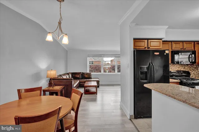 a view of a dining room with furniture