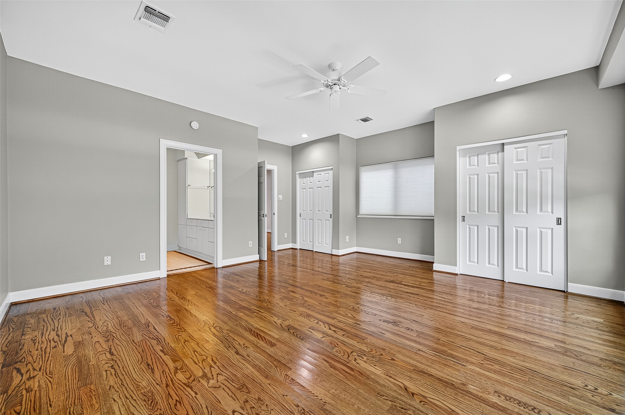 3027 Bissonnet Street Houston, TX 77005 - Photo 31 of 47 Large windows keep the secondary bedroom bright throughout the day
