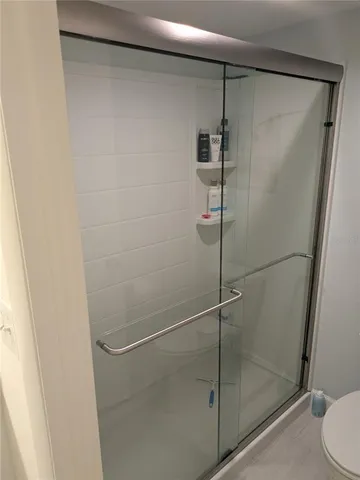 a view of a chairs and table in the patio