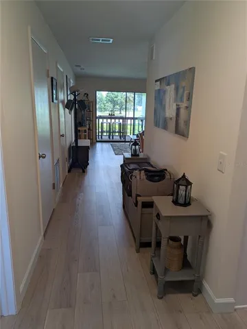 a view of a hallway with workspace