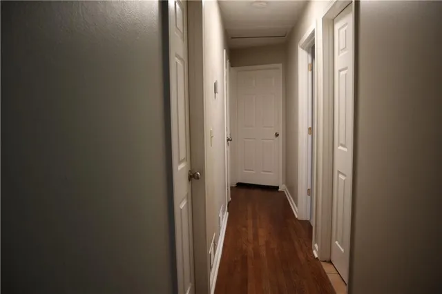 a view of a bathroom from the hallway