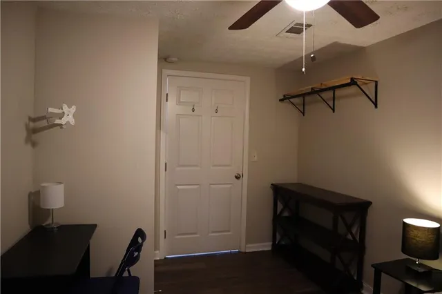 a view of a room with a workspace