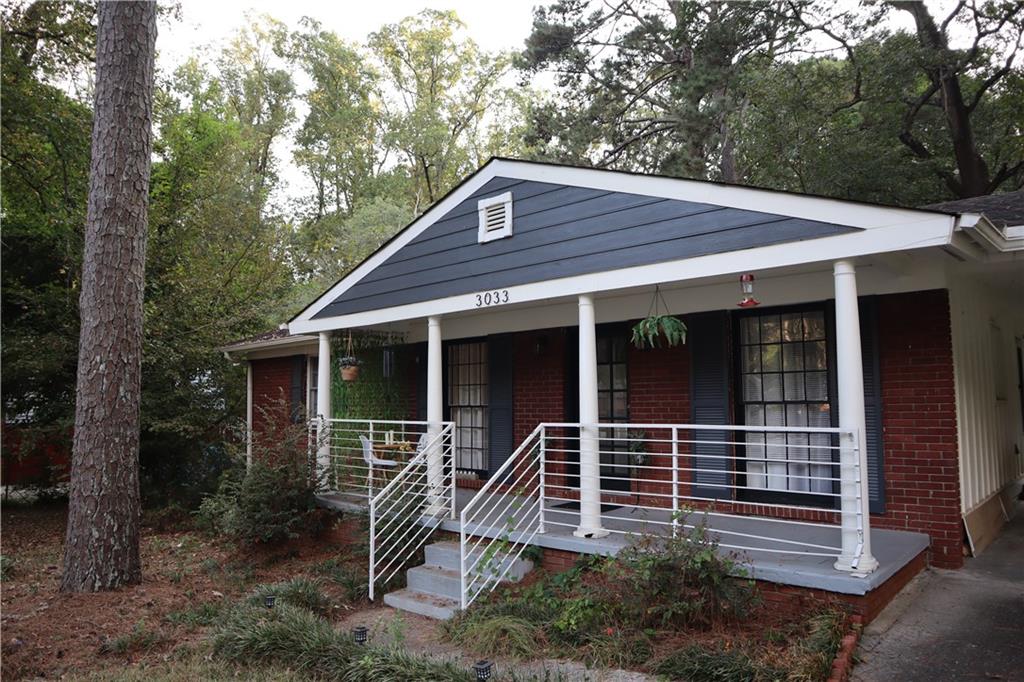 3033 Empire Boulevard Southwest Atlanta, GA 30354 - Photo 2 of 33 a house view with a garden space