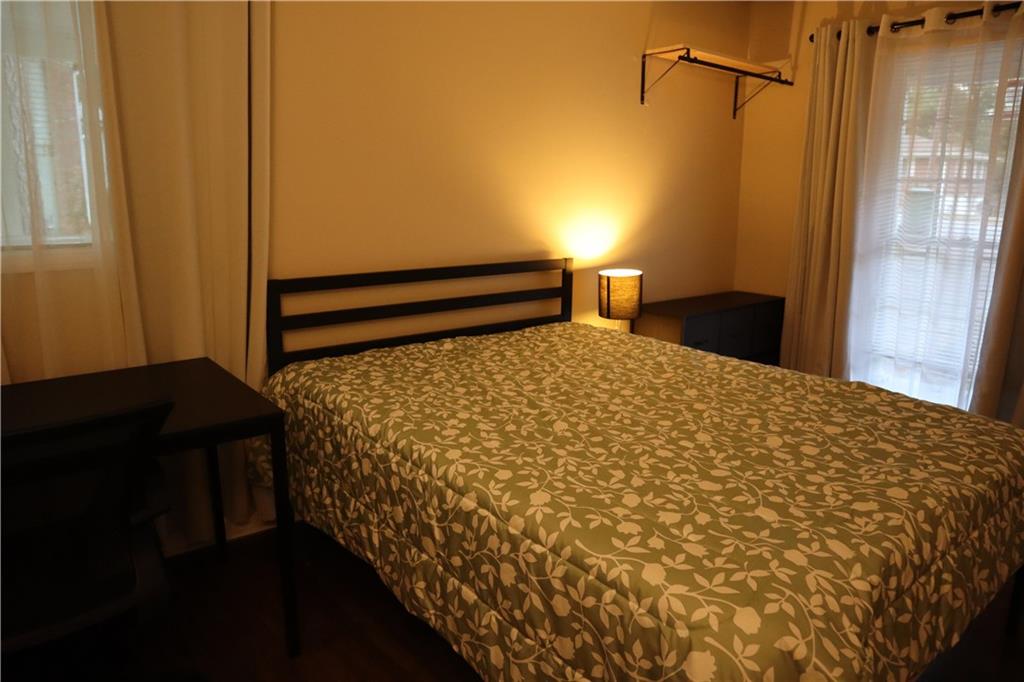 3033 Empire Boulevard Southwest Atlanta, GA 30354 - Photo 22 of 33 a bedroom with a bed and a window