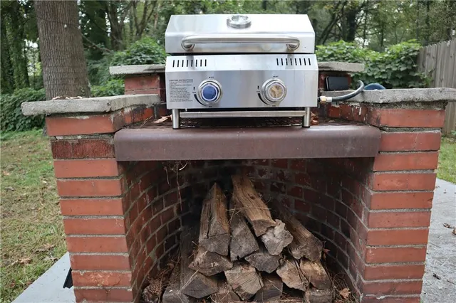 a sign that is on a brick wall