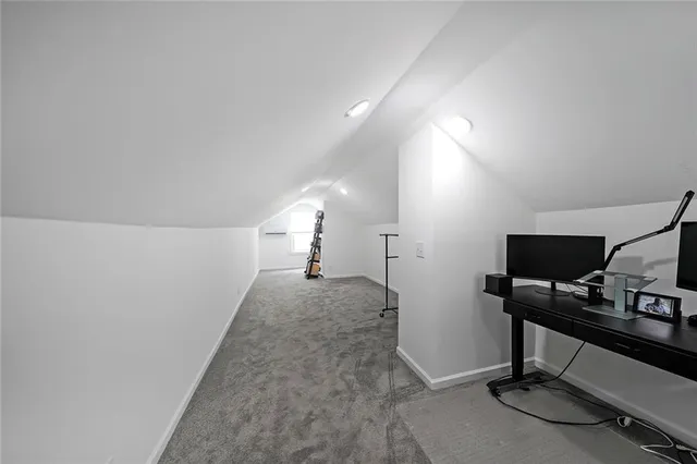 a view of a livingroom with a workspace