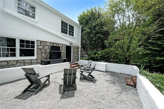 a view of a house with a sink and yard