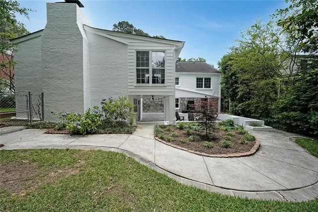 a view of a house with outdoor kitchen