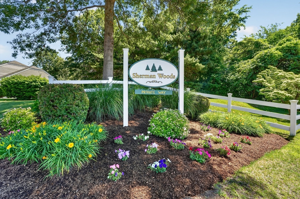 15 Evergreen Circle, Unit 15 Canton, MA 02021 - Photo 27 of 29 a view of a garden with plants