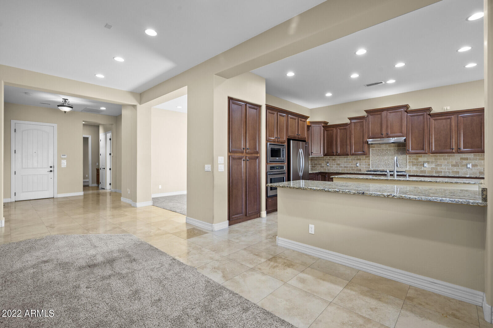 2810 East Blue Sage Road Gilbert, AZ 85297 - Photo 12 of 93 View from great room to the kitchen