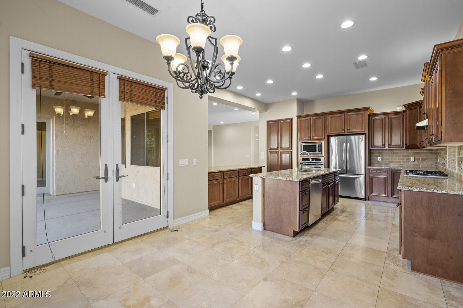 2810 East Blue Sage Road Gilbert, AZ 85297 - Photo 19 of 93 Kitchen opens to rear covered patio
