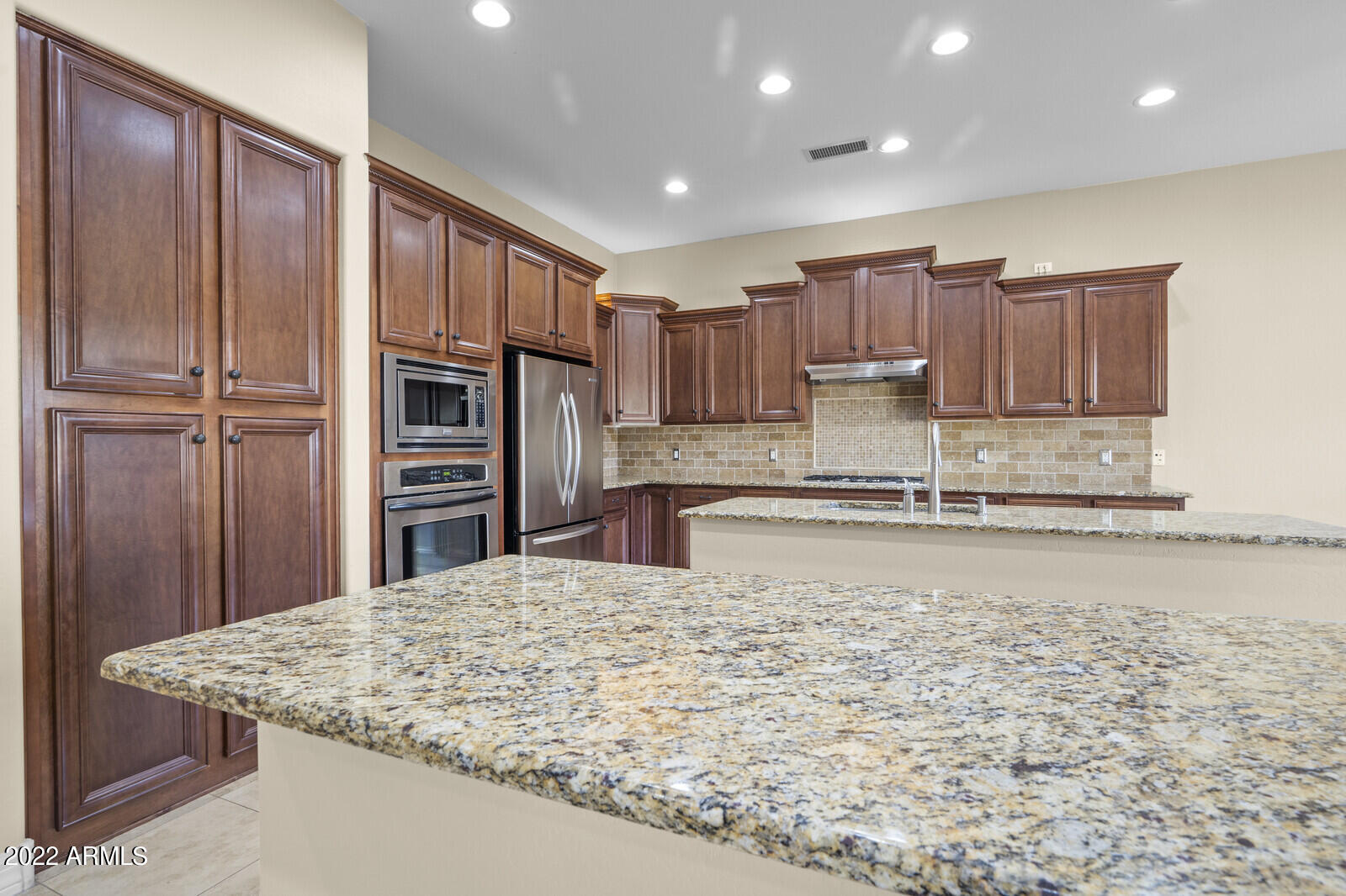 2810 East Blue Sage Road Gilbert, AZ 85297 - Photo 21 of 93 View over the breakfast bar seating