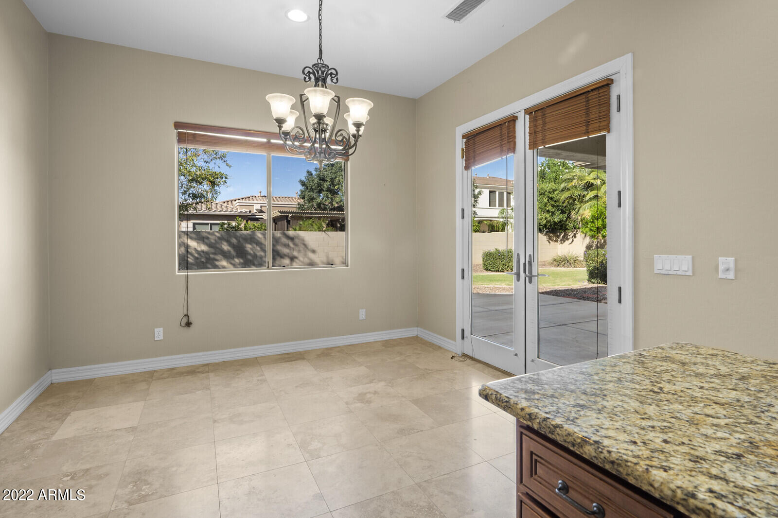 2810 East Blue Sage Road Gilbert, AZ 85297 - Photo 22 of 93 Casual dining overlooks rear yard