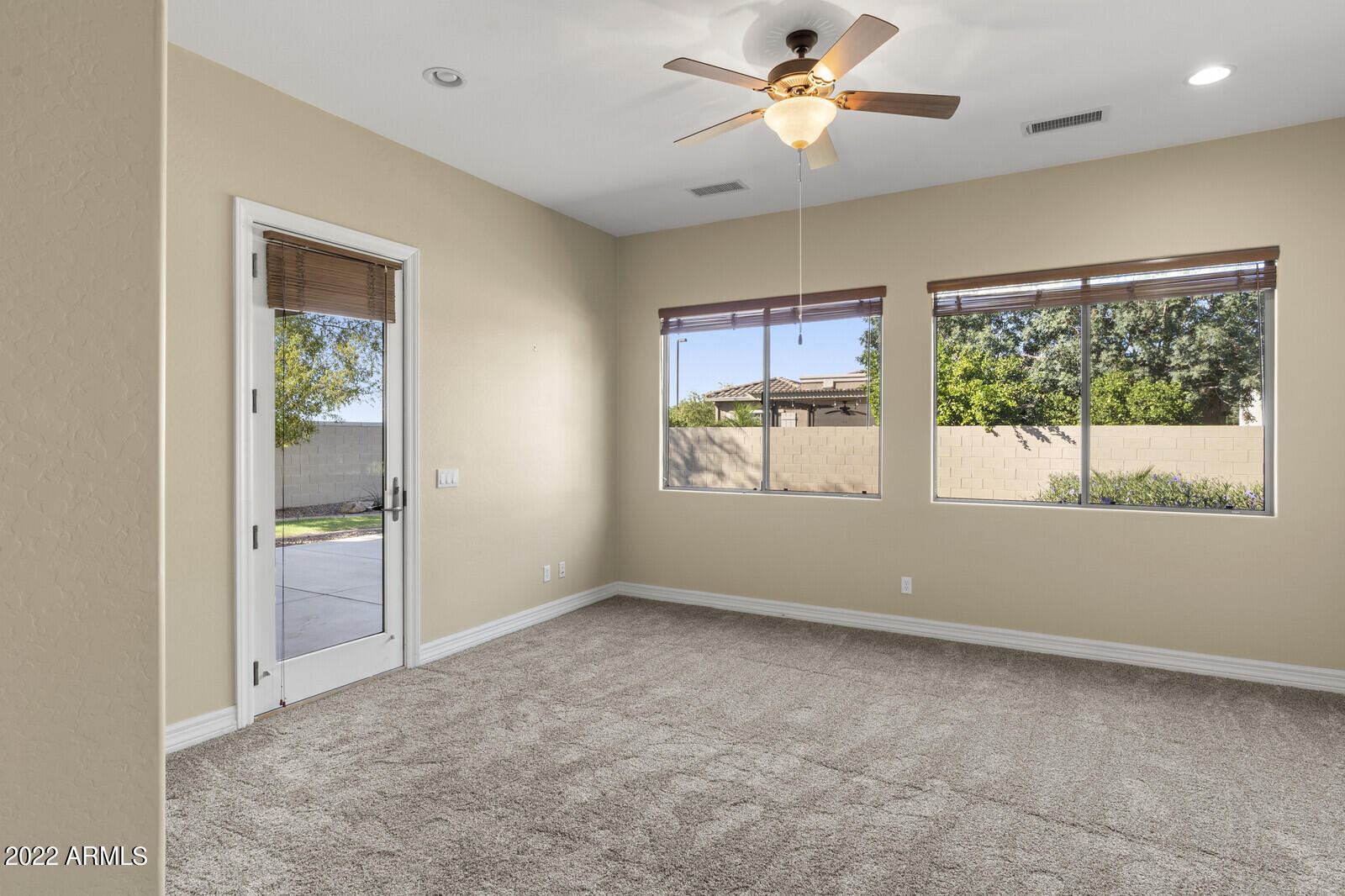 2810 East Blue Sage Road Gilbert, AZ 85297 - Photo 28 of 93 Primary suite opens to rear patio