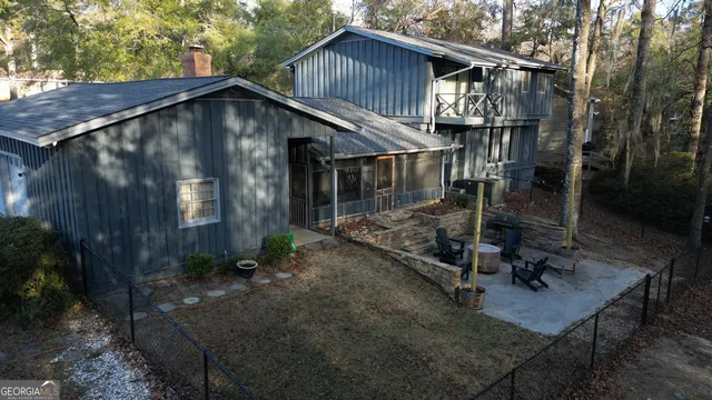 a backyard of a house with lots of green space