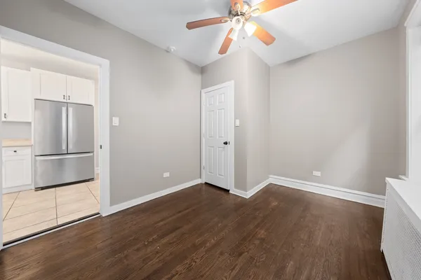 a kitchen with cabinets and steel stainless steel appliances