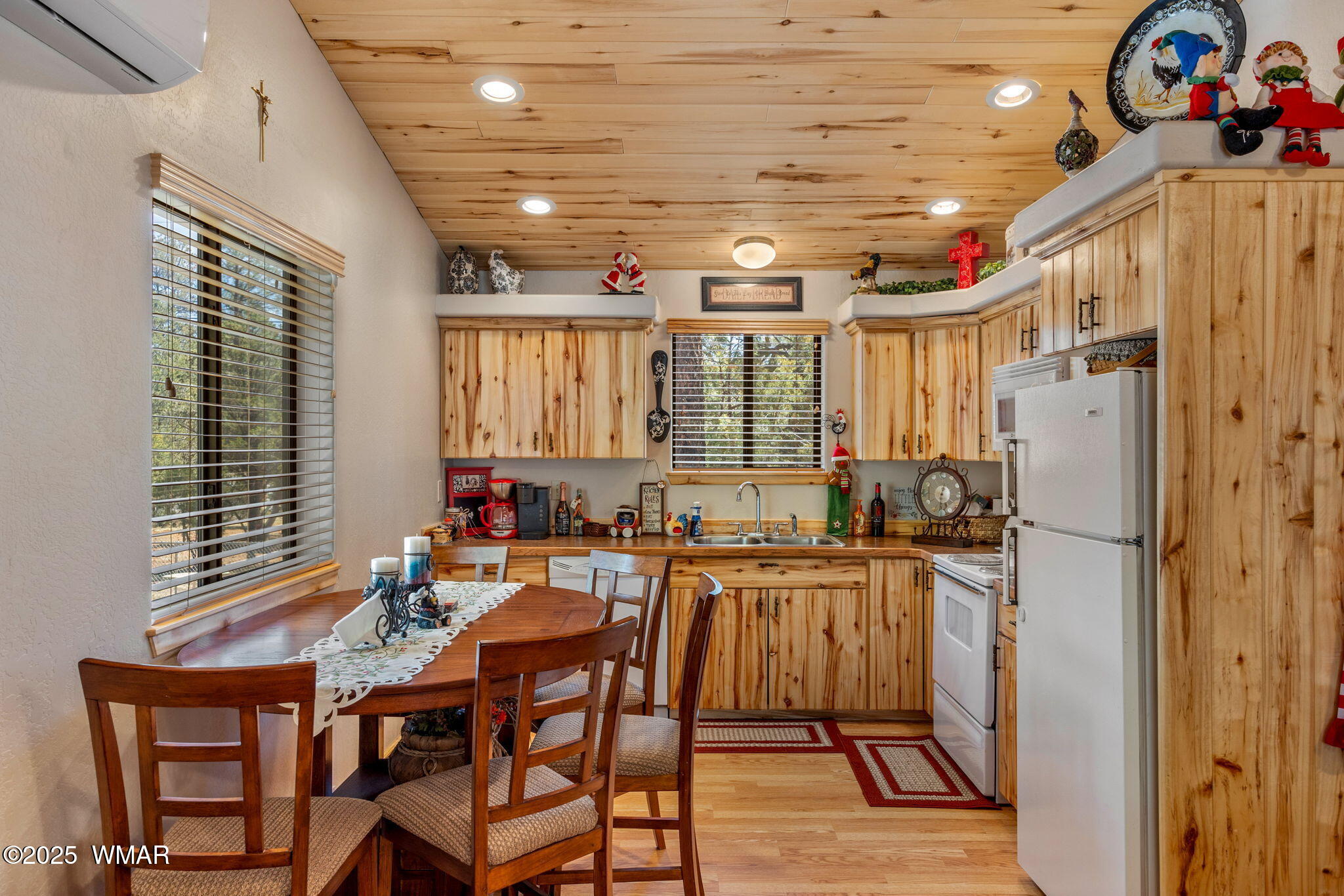 2979 Western Star Drive Overgaard, AZ 85933 - Photo 9 of 31 a view of a dining room with furniture window and wooden floor