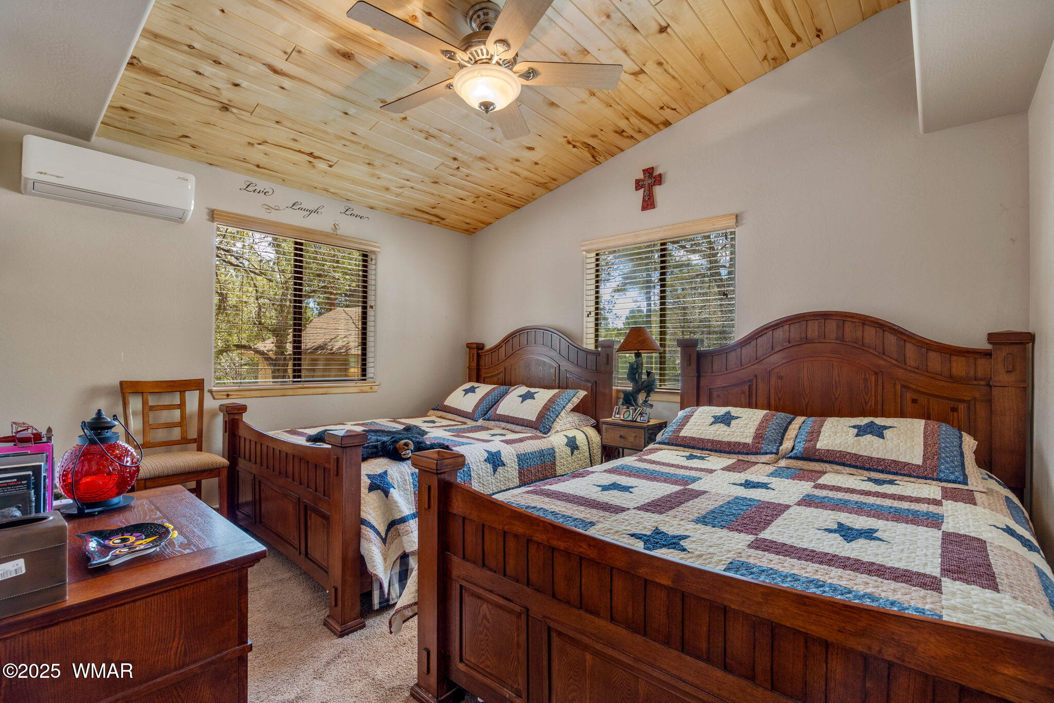 2979 Western Star Drive Overgaard, AZ 85933 - Photo 16 of 31 a bedroom with furniture and a window