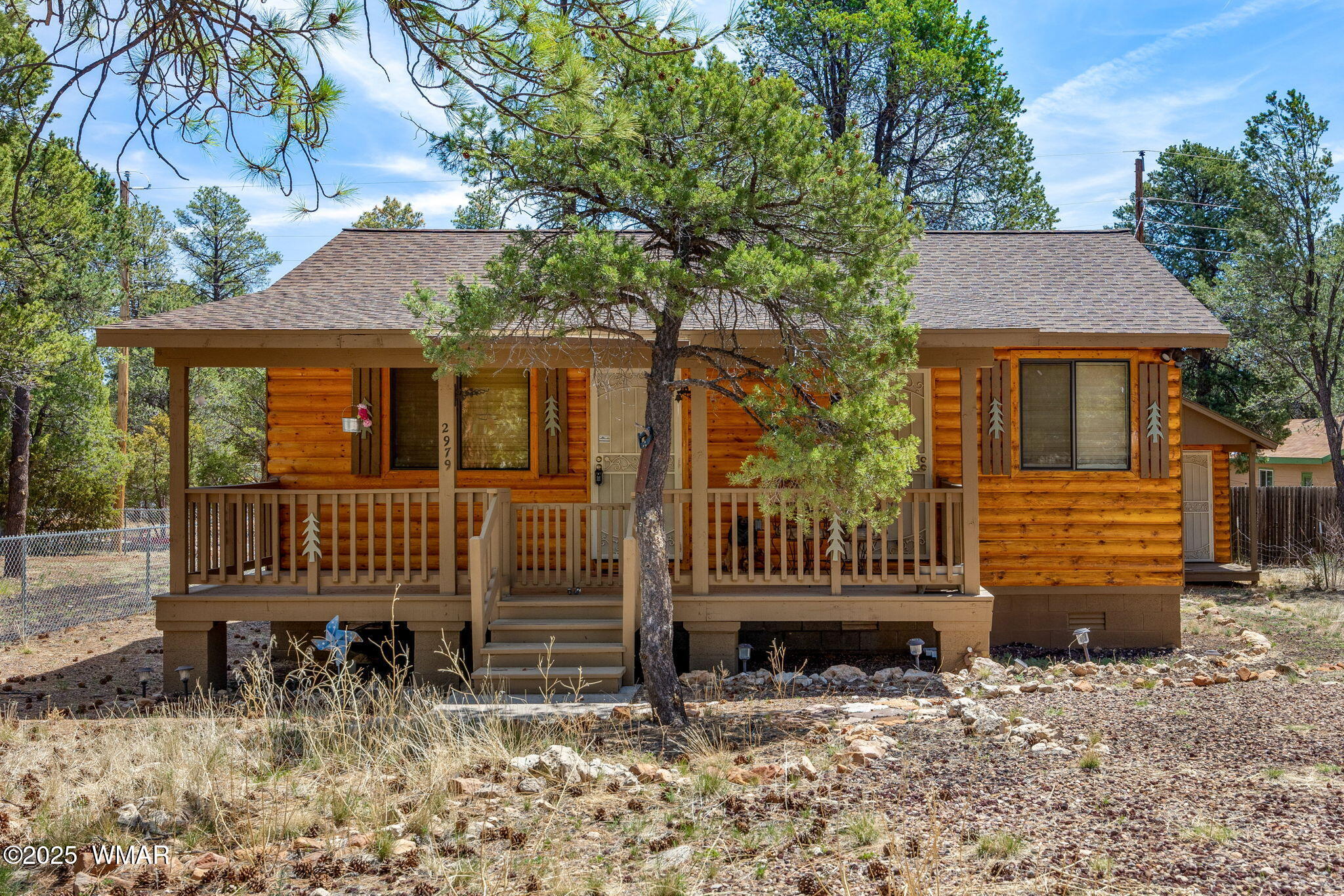 2979 Western Star Drive Overgaard, AZ 85933 - Photo 3 of 31 front view of a house with a yard
