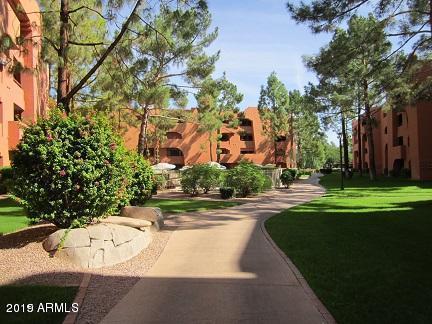 4303 East Cactus Road, Unit 116 Phoenix, AZ 85032 - Photo 30 of 35 a view of a park with large trees