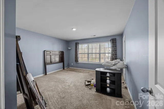 a workspace with furniture and window