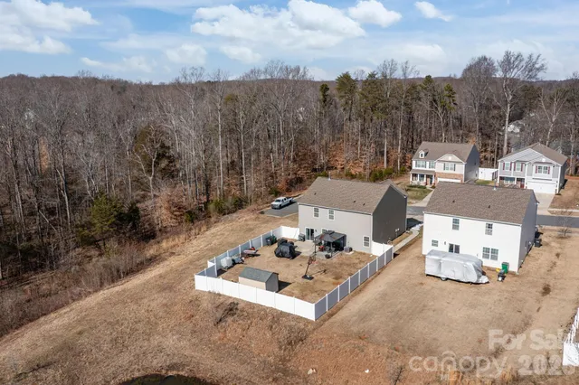 a view of a terrace with a table and chairs