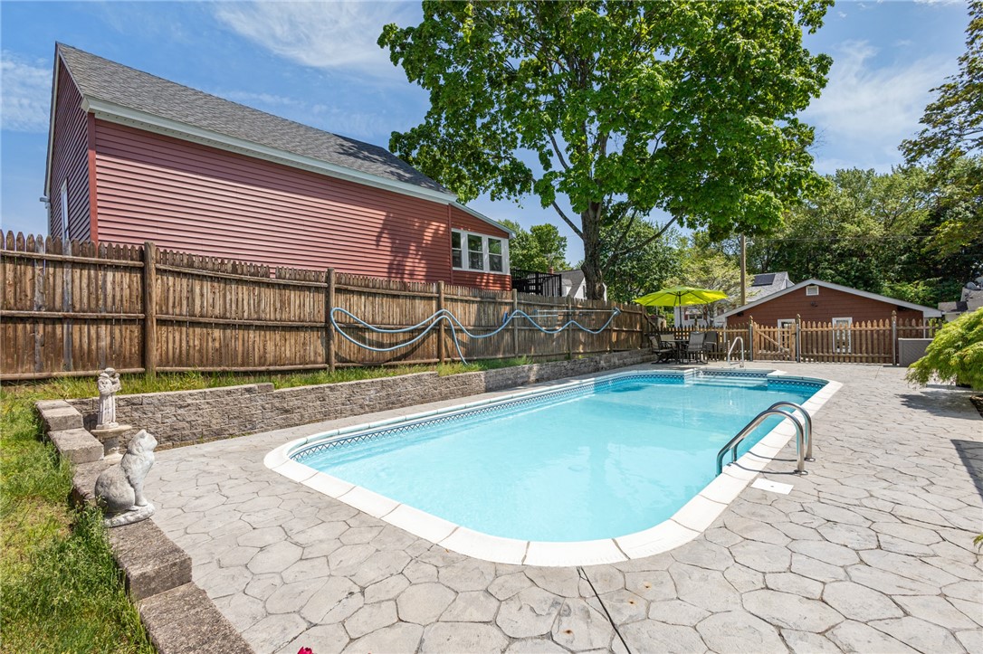 11 Bourassa Avenue Woonsocket, RI 02895 - Photo 34 of 39 In-ground pool and patio
