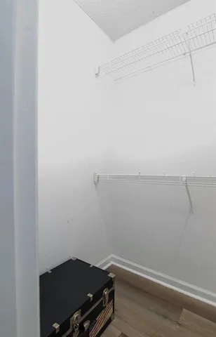 a view of small space with racks on the wall