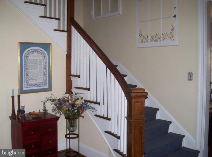 1013 Windsor Road Pikesville, MD 21208 - Photo 4 of 27 Lovely Curved Stairs in Spacious Foyer