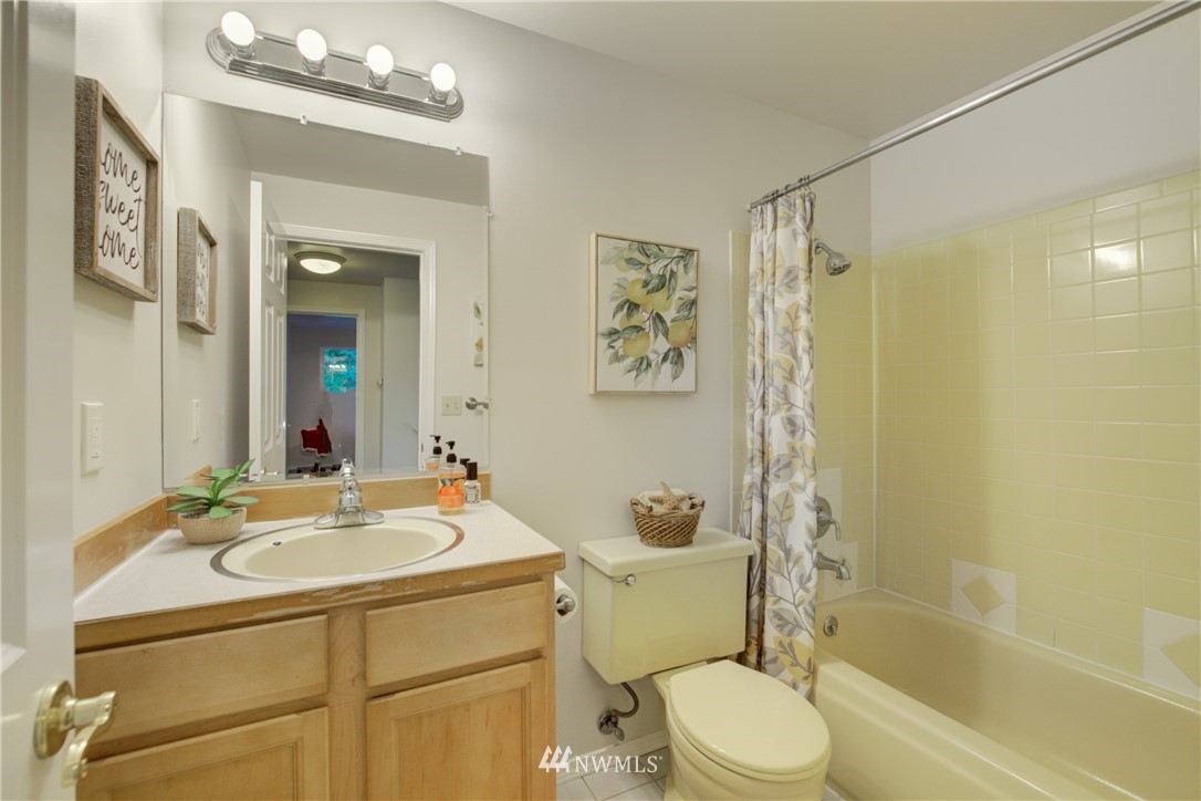 21930 3rd Place West Bothell, WA 98021 - Photo 21 of 34 a bathroom with a sink toilet and shower