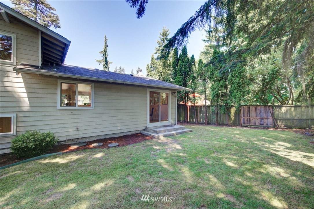 21930 3rd Place West Bothell, WA 98021 - Photo 32 of 34 a backyard of a house with seating space
