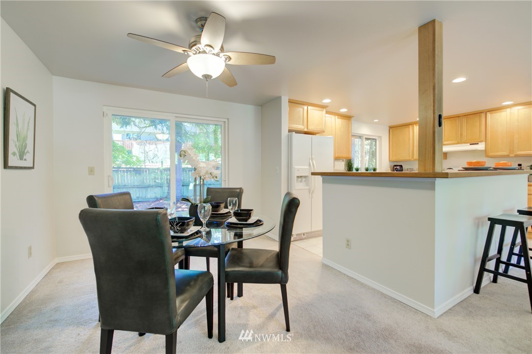 21930 3rd Place West Bothell, WA 98021 - Photo 9 of 34 a dining room with furniture and window