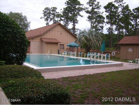 3 Remington Road Ormond Beach, FL 32174 - Photo 12 of 18 a view of a house with a yard