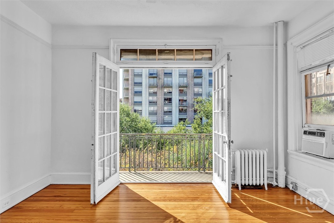 24 East Liberty, Unit 42 Savannah, GA 31401 - Photo 27 of 44 front bedroom/den opens onto balcony