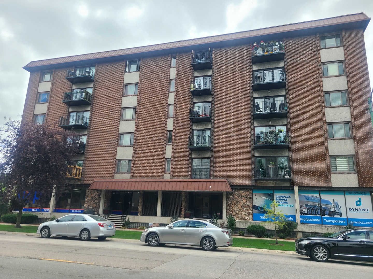 8359 West Addison Street, Unit 201 Chicago, IL 60634 - Photo 1 of 22 a car parked in front of a building