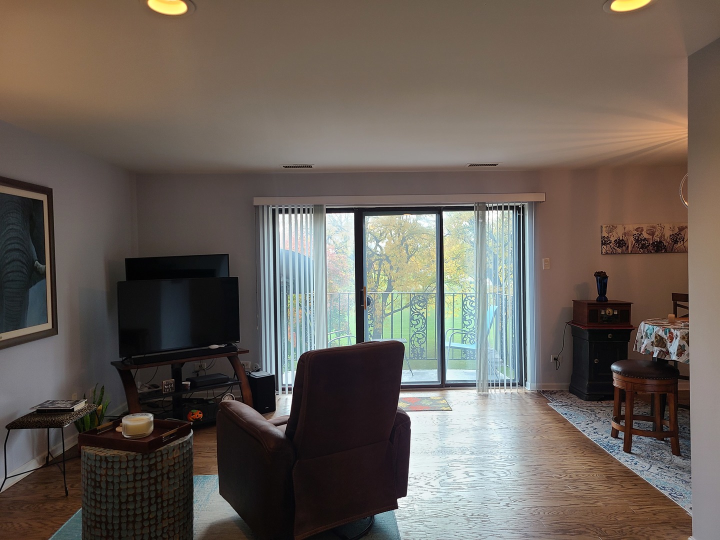 8359 West Addison Street, Unit 201 Chicago, IL 60634 - Photo 11 of 22 a living room with furniture and a flat screen tv