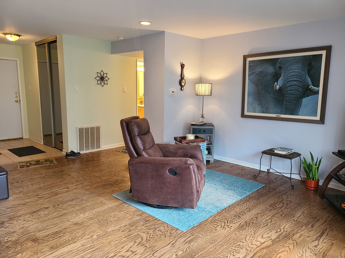 8359 West Addison Street, Unit 201 Chicago, IL 60634 - Photo 13 of 22 a living room with furniture and a table