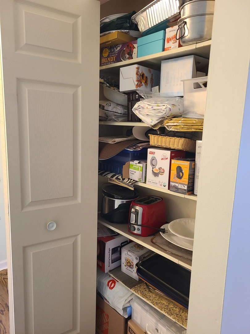 8359 West Addison Street, Unit 201 Chicago, IL 60634 - Photo 22 of 22 a room with storage and utility