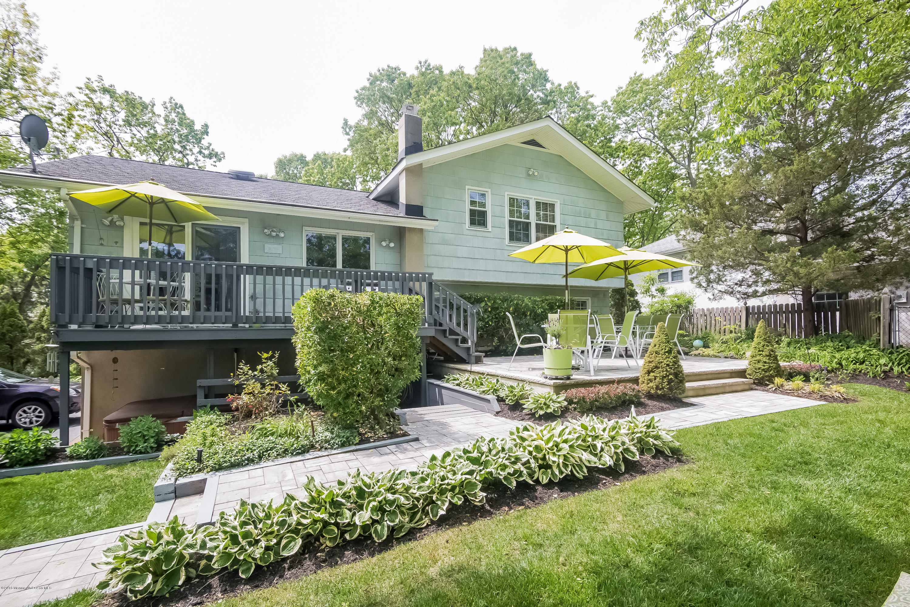 1210 Ivy Road Manasquan, NJ 08736 - Photo 3 of 25 a view of a house with a yard and potted plants