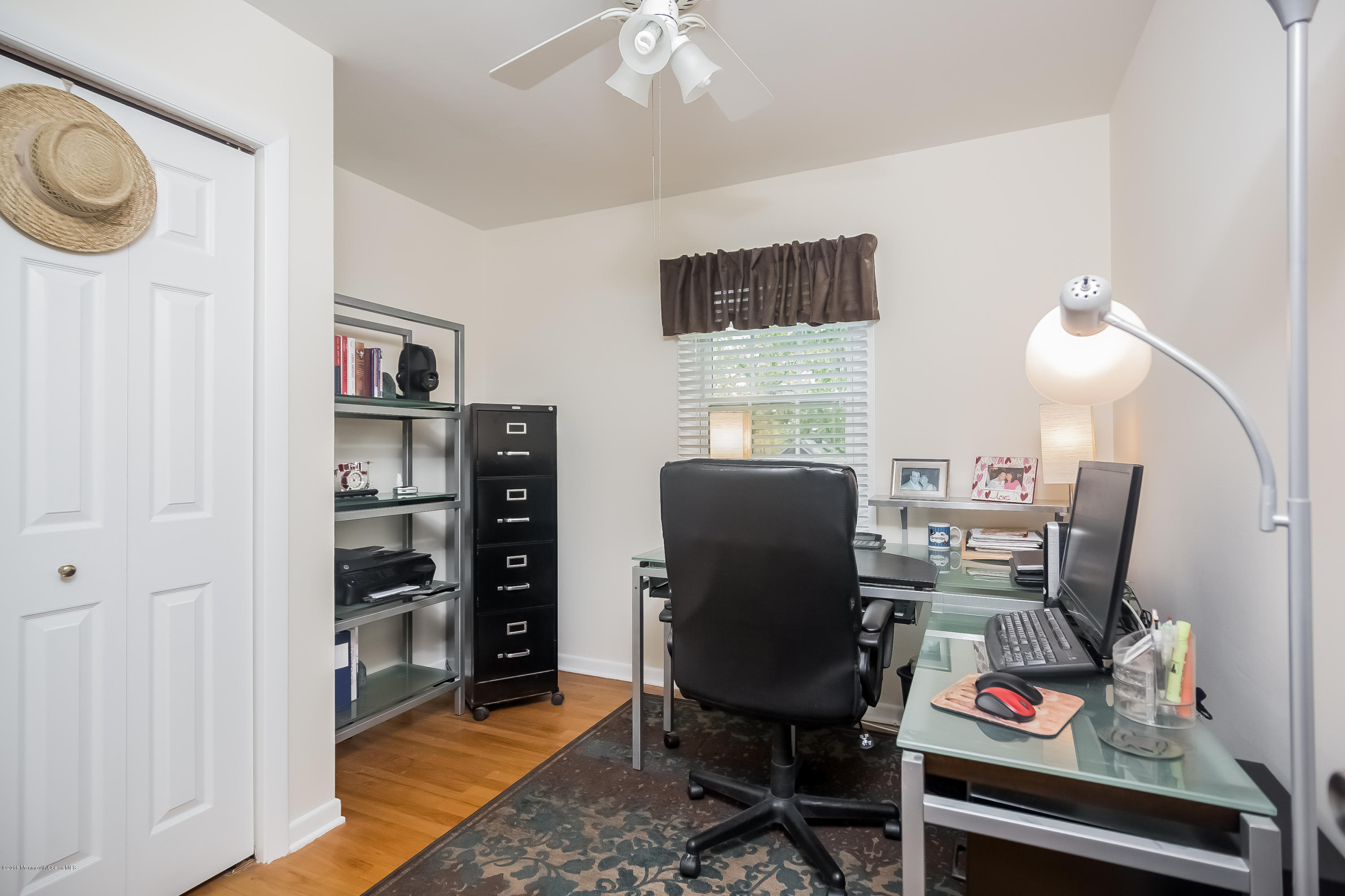1210 Ivy Road Manasquan, NJ 08736 - Photo 21 of 25 a view of a workspace with furniture and a window