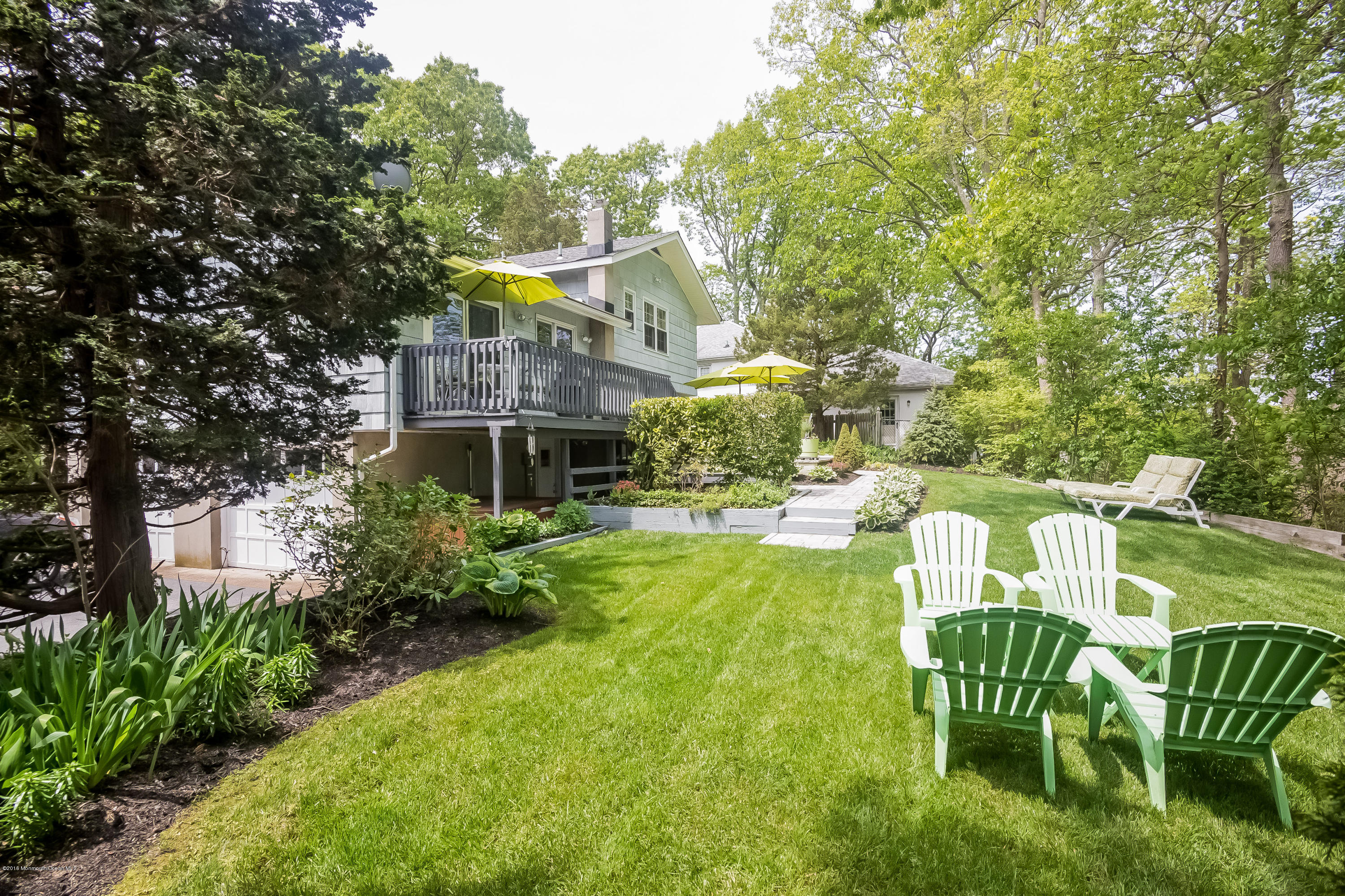 1210 Ivy Road Manasquan, NJ 08736 - Photo 6 of 25 a view of an chairs and table in the patio