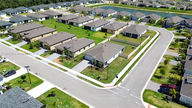 an aerial view of a house with a garden