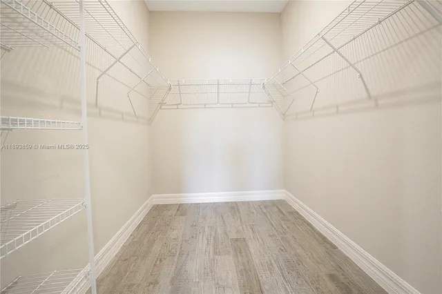 a view of a room with racks on the wall