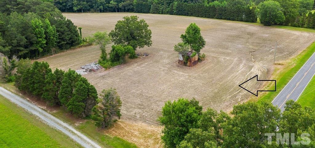 0 Darroch Road Lillington, NC 27546 - Photo 3 of 12 a view of a garden with lawn chairs