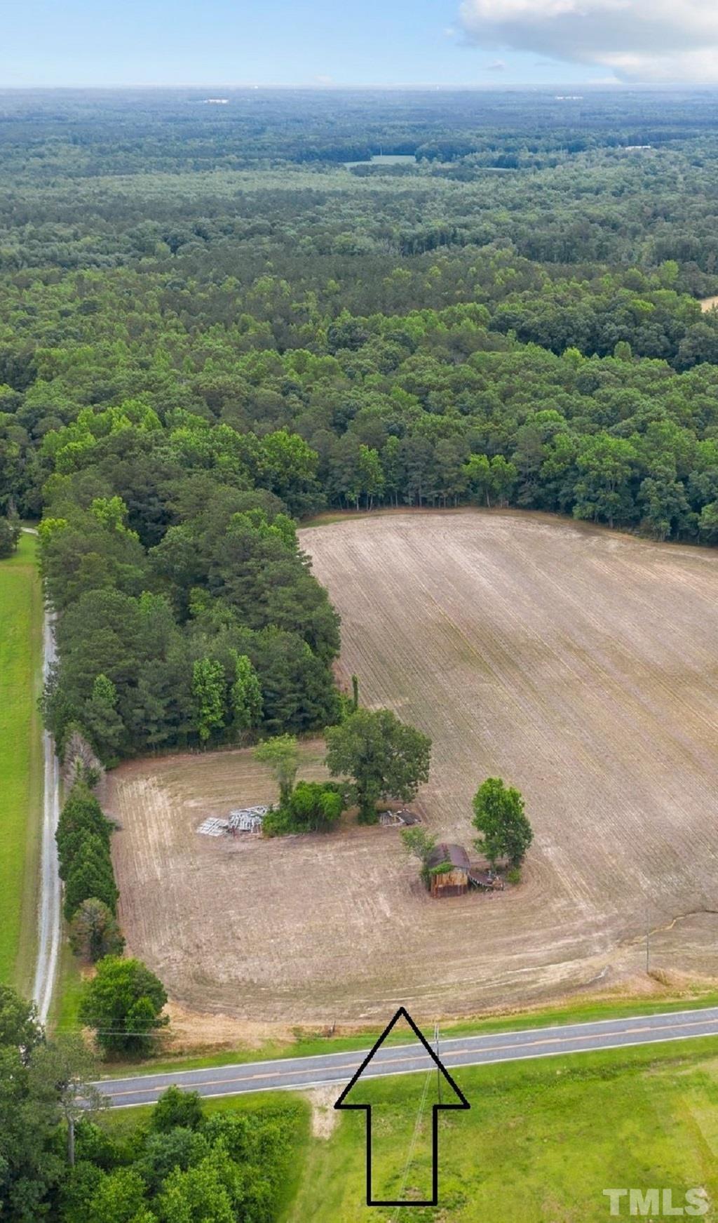 0 Darroch Road Lillington, NC 27546 - Photo 7 of 12 a view of a lake with a yard