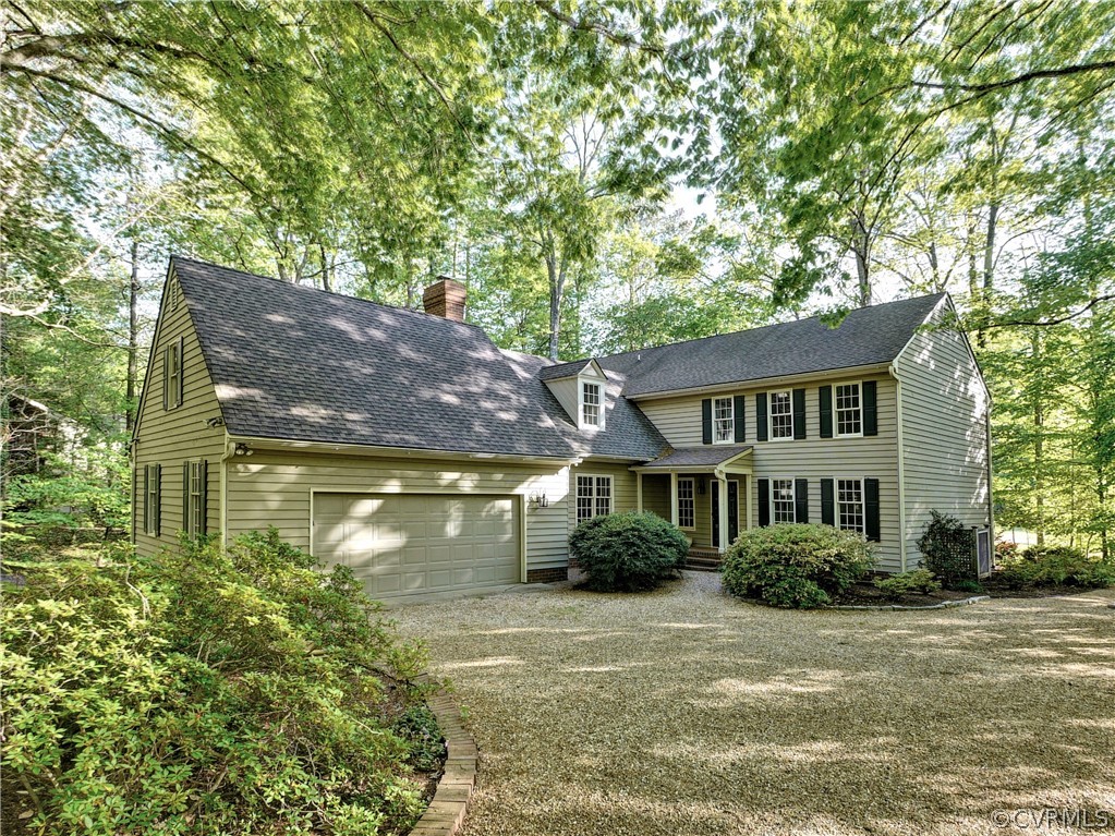 a view of a house with a garden