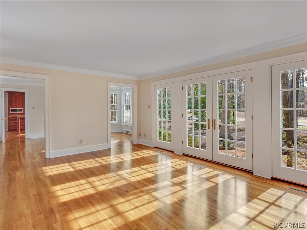 3900 Timber Ridge Road Midlothian, VA 23112 - Photo 18 of 44 a view of an empty room with glass door