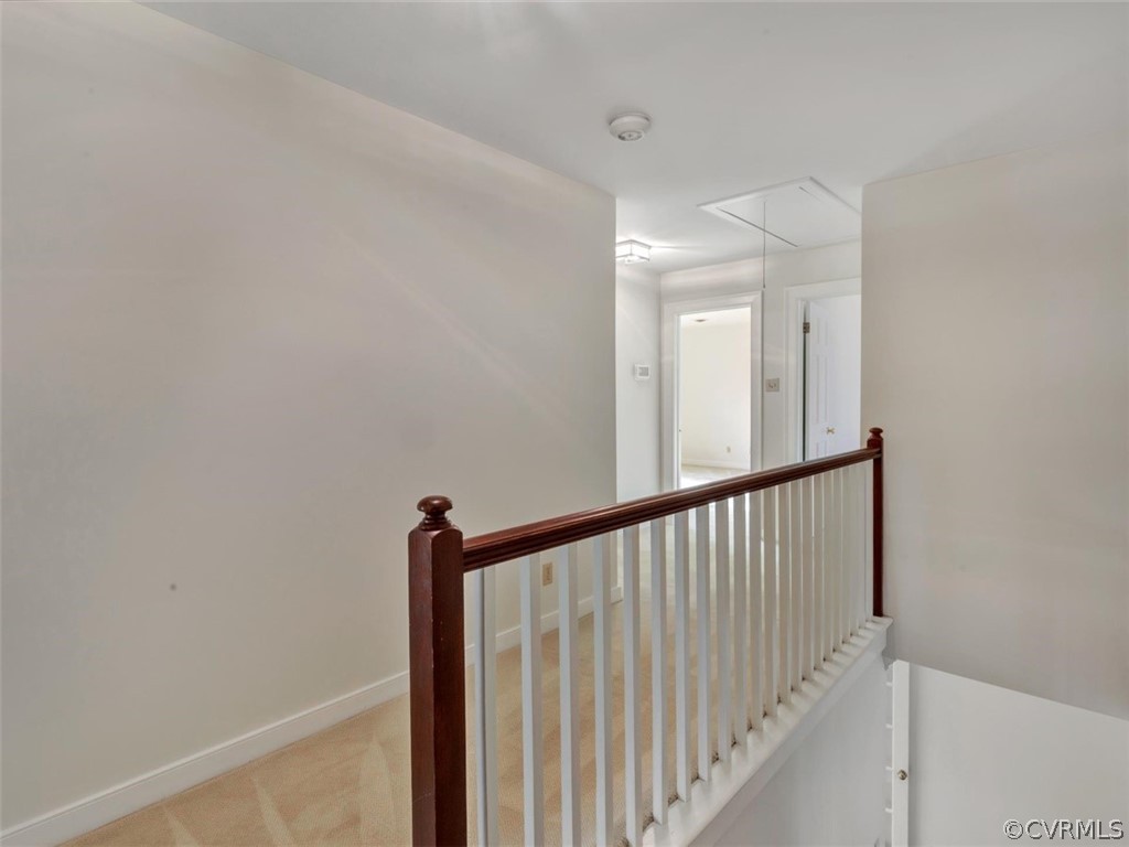 3900 Timber Ridge Road Midlothian, VA 23112 - Photo 24 of 44 a view of a hallway with wooden floor