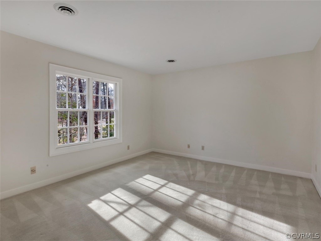 3900 Timber Ridge Road Midlothian, VA 23112 - Photo 30 of 44 an empty room with windows