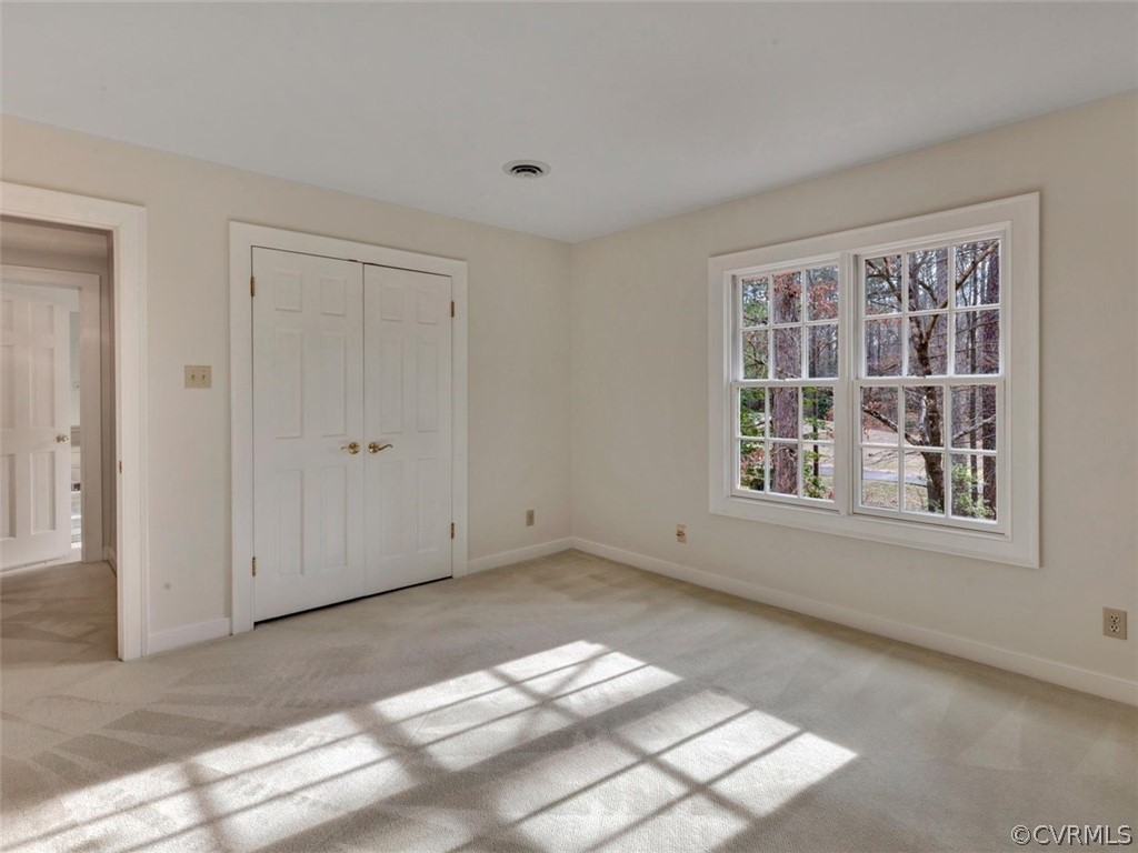 3900 Timber Ridge Road Midlothian, VA 23112 - Photo 31 of 44 an empty room with windows
